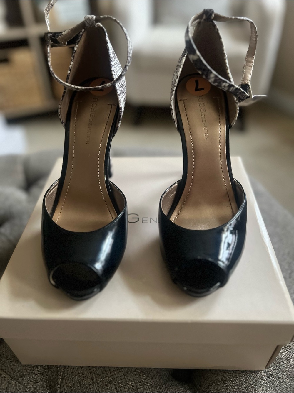 BCBGeneration Black Peep-Toe Heels with Snake-Print Ankle Strap